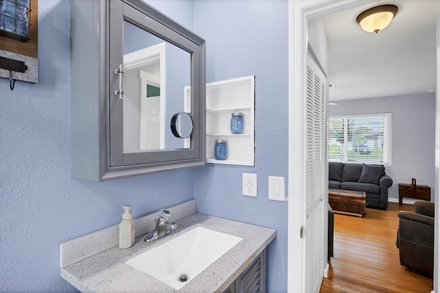 1778 N Salford Blvd, North Port, FL 34286 - bathroom with wood finished floors and vanity