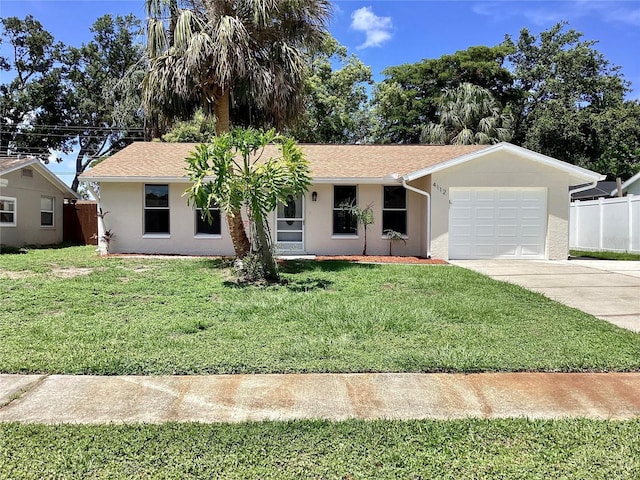 4112 Cochise Ter, Sarasota, FL 34233 - ranch-style house with an attached garage, stucco siding, and concrete driveway