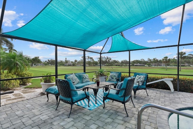 538 Magellan Dr, Sarasota, FL 34243 - view of patio with view of golf course, an outdoor living space, and glass enclosure