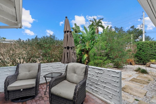 538 Magellan Dr, Sarasota, FL 34243 - wooden terrace with a patio area