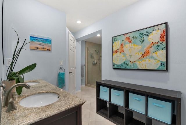 538 Magellan Dr, Sarasota, FL 34243 - full bathroom with a stall shower, double vanity, tile patterned flooring, and recessed lighting