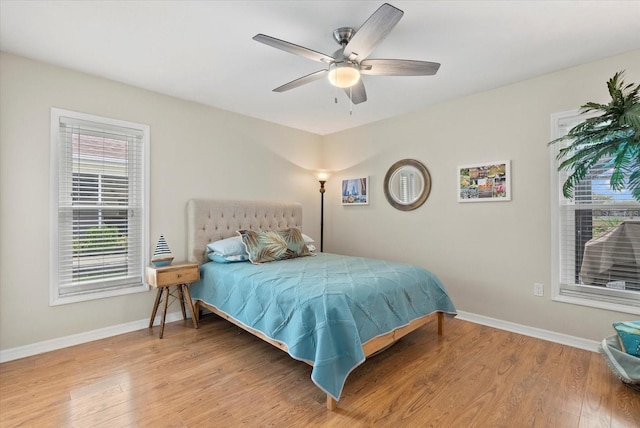 538 Magellan Dr, Sarasota, FL 34243 - bedroom with wood finished floors and ceiling fan