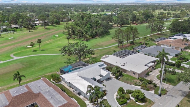 538 Magellan Dr, Sarasota, FL 34243 - aerial view of residential area with a local golf course and a tree filled landscape