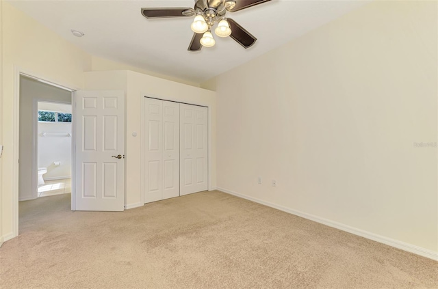 6610 Rosy Barb Ct, Lakewood Ranch, FL 34202 - unfurnished bedroom featuring light colored carpet, a closet, and ceiling fan