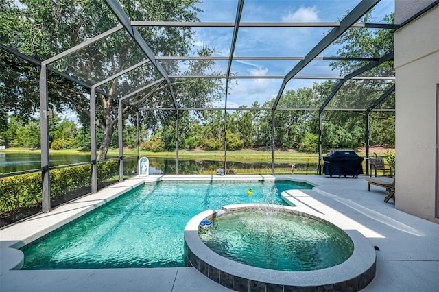 6610 Rosy Barb Ct, Lakewood Ranch, FL 34202 - view of pool featuring a pool with connected hot tub, a water view, a patio area, a grill, and view of scattered trees
