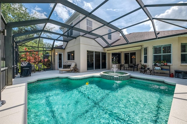 6610 Rosy Barb Ct, Lakewood Ranch, FL 34202 - view of swimming pool with a patio, a grill, a pool with connected hot tub, and a lanai