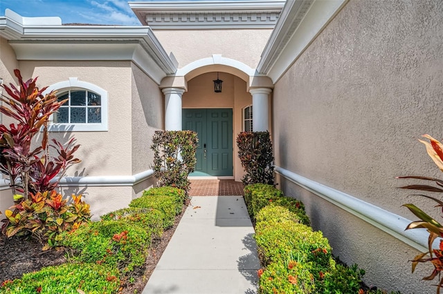 6610 Rosy Barb Ct, Lakewood Ranch, FL 34202 - property entrance with stucco siding