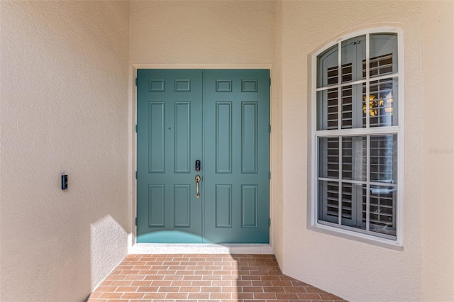 6610 Rosy Barb Ct, Lakewood Ranch, FL 34202 - view of exterior entry with stucco siding