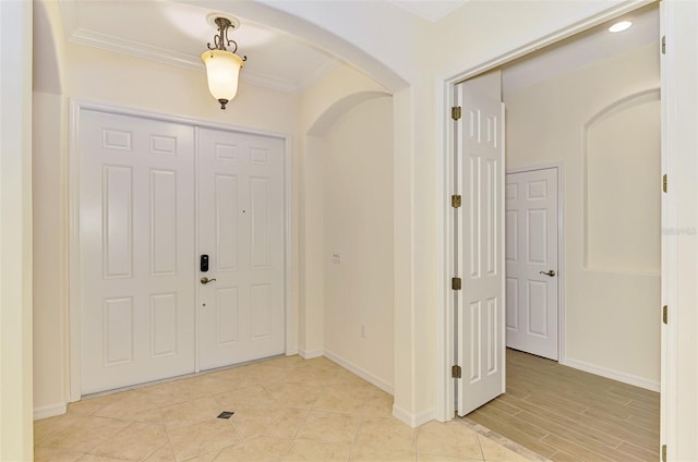 6610 Rosy Barb Ct, Lakewood Ranch, FL 34202 - entrance foyer featuring arched walkways and ornamental molding