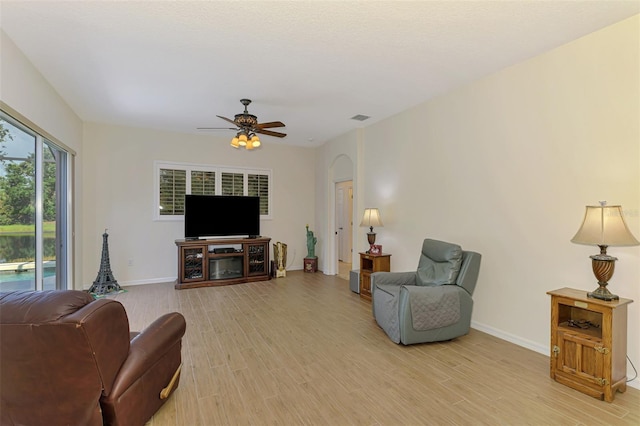 6610 Rosy Barb Ct, Lakewood Ranch, FL 34202 - living area featuring light wood-style flooring and ceiling fan