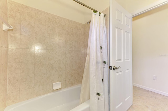 6610 Rosy Barb Ct, Lakewood Ranch, FL 34202 - bathroom featuring shower / bathtub combination with curtain and tile patterned flooring