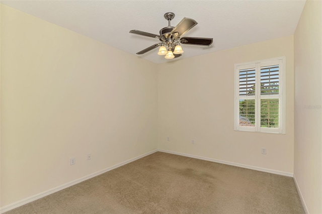 6610 Rosy Barb Ct, Lakewood Ranch, FL 34202 - spare room with light carpet and a ceiling fan