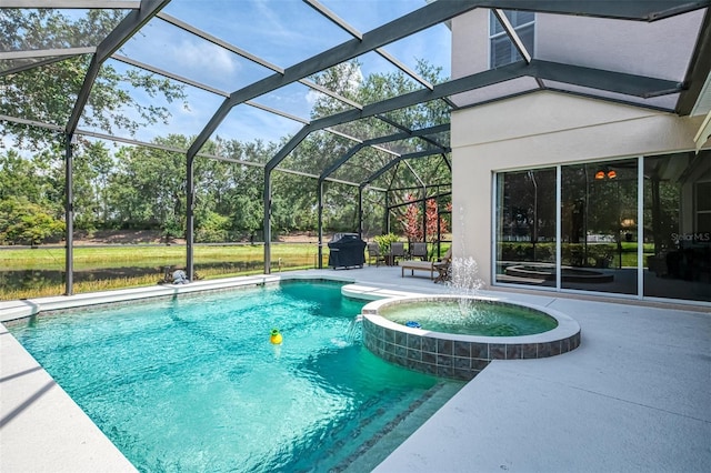 6610 Rosy Barb Ct, Lakewood Ranch, FL 34202 - view of pool featuring a patio, a pool with connected hot tub, and a lanai