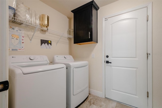 3524 Brownwood Ter, North Port, FL 34286 - washroom with washer and clothes dryer and cabinet space