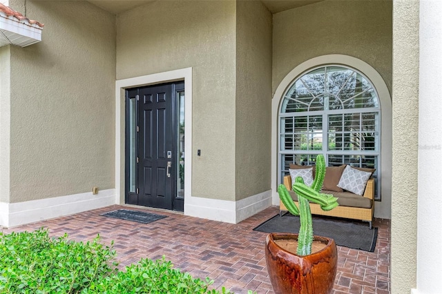 12814 Daisy Pl, Bradenton, FL 34212 - view of exterior entry featuring stucco siding