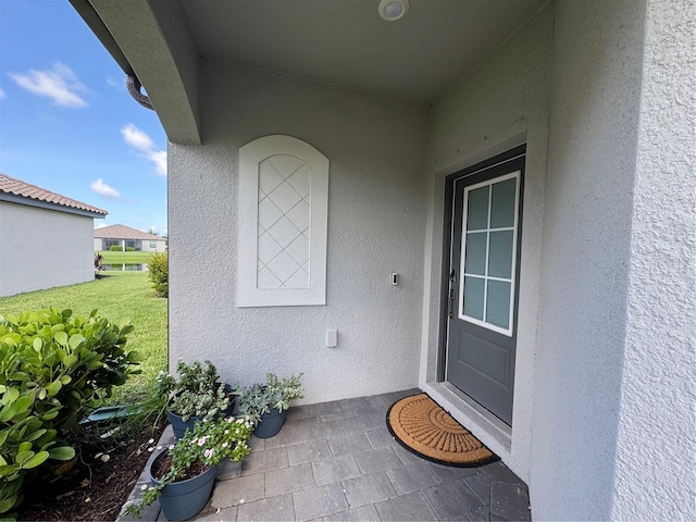 16087 Sunny Day Dr, Bradenton, FL 34211 - doorway to property with stucco siding