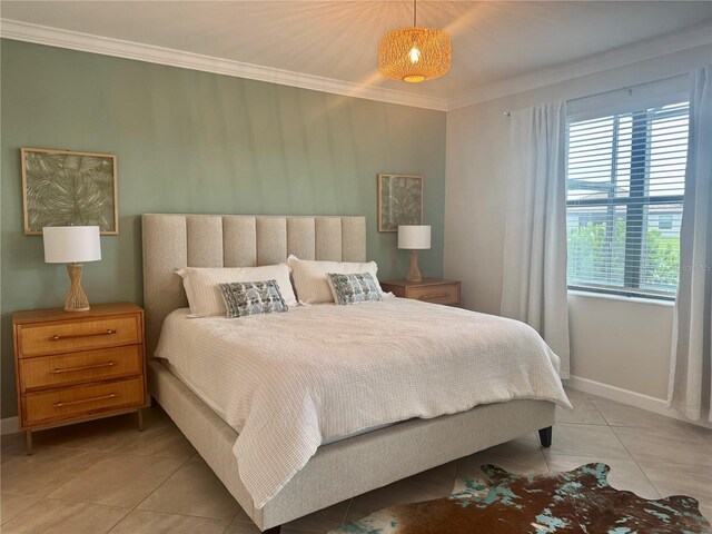 16087 Sunny Day Dr, Bradenton, FL 34211 - bedroom featuring light tile patterned floors and ornamental molding