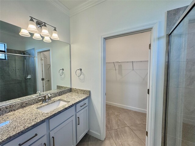 16087 Sunny Day Dr, Bradenton, FL 34211 - full bath with ornamental molding, a shower stall, a spacious closet, and vanity