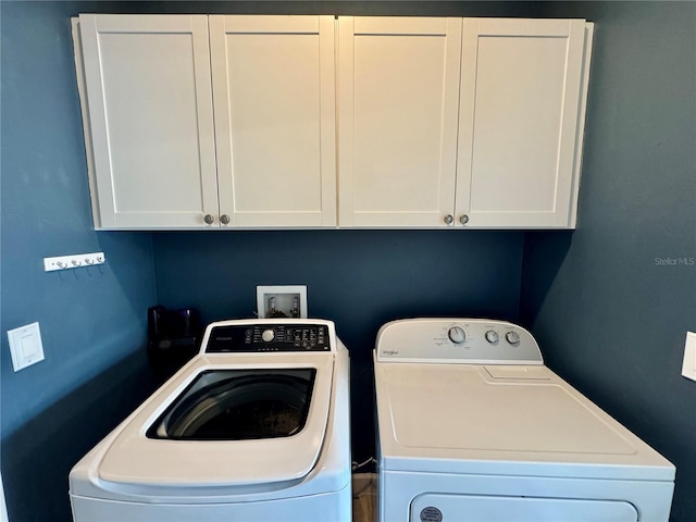 16087 Sunny Day Dr, Bradenton, FL 34211 - laundry room with washing machine and dryer and cabinet space