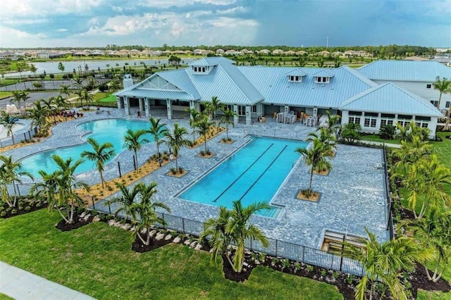 16087 Sunny Day Dr, Bradenton, FL 34211 - community pool featuring a patio area