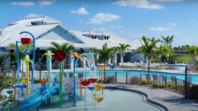 16087 Sunny Day Dr, Bradenton, FL 34211 - view of playground with a water play area and a community pool