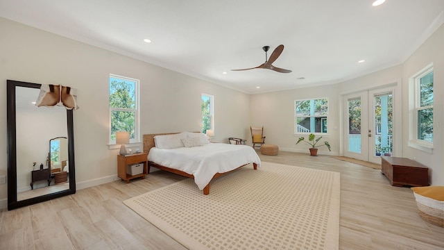 1076 Toc0Baga, Sarasota, FL 34234 - bedroom featuring multiple windows, access to exterior, light wood-style floors, crown molding, and recessed lighting