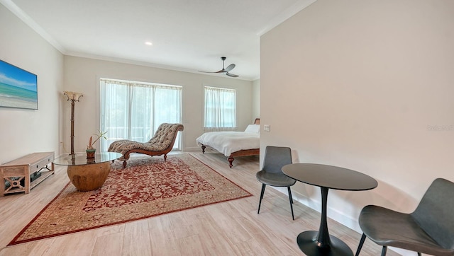 1076 Toc0Baga, Sarasota, FL 34234 - sitting room with ornamental molding, wood finished floors, a ceiling fan, and recessed lighting