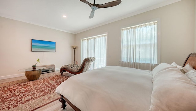 1076 Toc0Baga, Sarasota, FL 34234 - bedroom featuring wood finished floors, crown molding, a ceiling fan, and recessed lighting