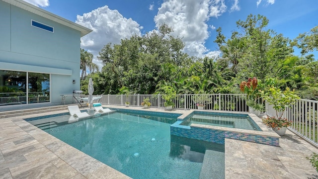1076 Toc0Baga, Sarasota, FL 34234 - view of swimming pool featuring a patio area and a pool with connected hot tub