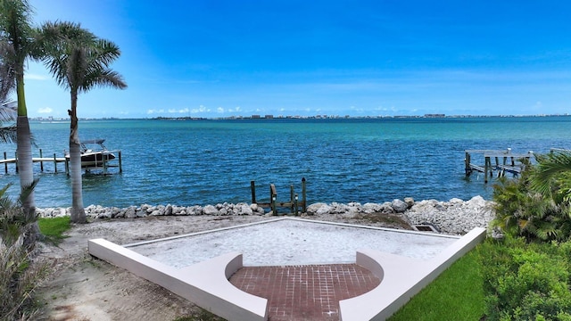 1076 Toc0Baga, Sarasota, FL 34234 - dock area with a water view