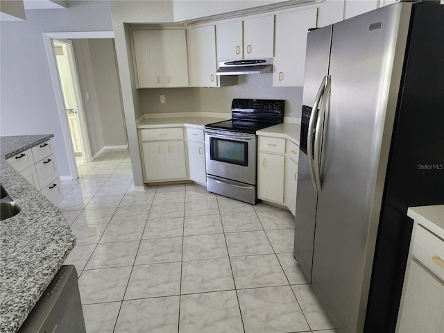 4354 Rock Creek Dr, Port Charlotte, FL 33948 - kitchen with stainless steel appliances, under cabinet range hood, and light stone countertops