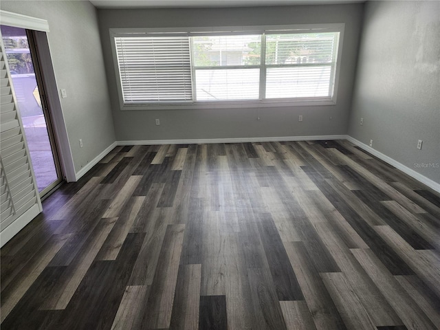 4354 Rock Creek Dr, Port Charlotte, FL 33948 - unfurnished room featuring dark wood-type flooring and baseboards