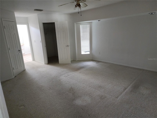4354 Rock Creek Dr, Port Charlotte, FL 33948 - unfurnished bedroom featuring light colored carpet and ceiling fan
