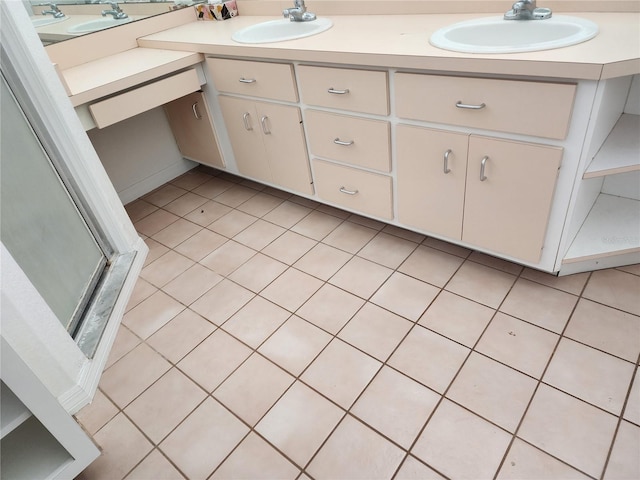 4354 Rock Creek Dr, Port Charlotte, FL 33948 - bathroom featuring double vanity, a stall shower, and tile patterned flooring