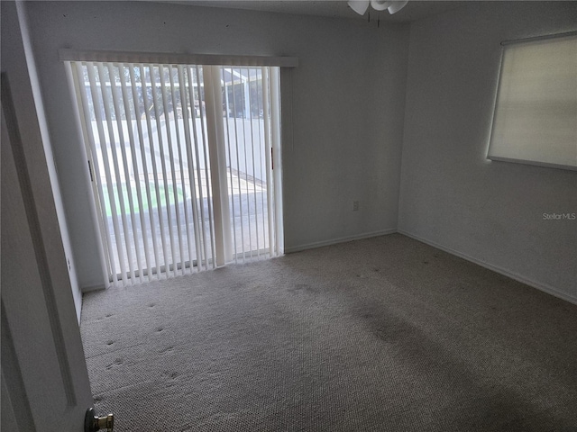 4354 Rock Creek Dr, Port Charlotte, FL 33948 - spare room with carpet and ceiling fan