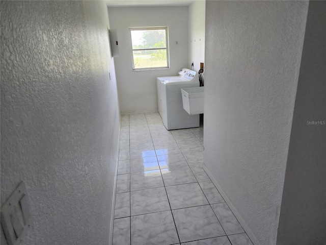 4354 Rock Creek Dr, Port Charlotte, FL 33948 - washroom with a textured wall, independent washer and dryer, light tile patterned flooring, and electric panel
