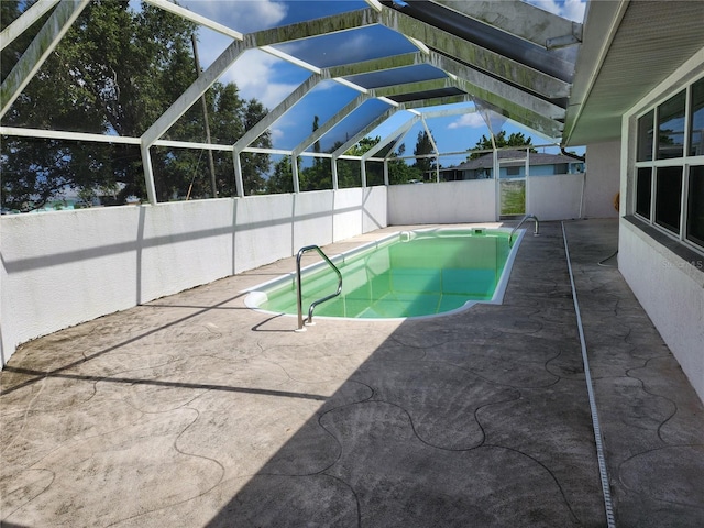 4354 Rock Creek Dr, Port Charlotte, FL 33948 - view of swimming pool featuring a patio area, a fenced backyard, and glass enclosure