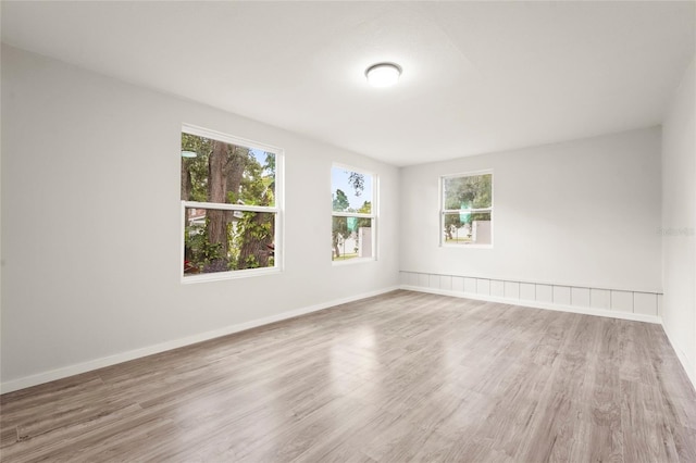 1008 37th St W, Bradenton, FL 34205 - spare room with wood finished floors and baseboards