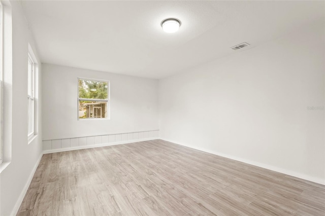 1008 37th St W, Bradenton, FL 34205 - spare room with wood finished floors and baseboards