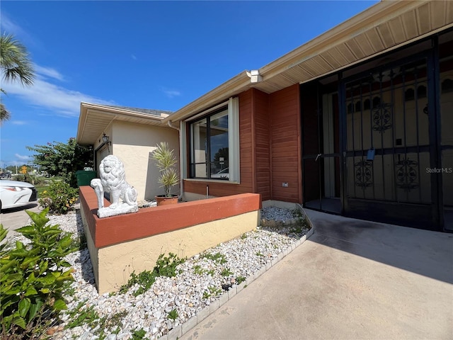 19358 Edgewater Dr, Port Charlotte, FL 33948 - entrance to property with stucco siding