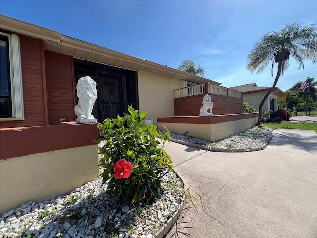19358 Edgewater Dr, Port Charlotte, FL 33948 - view of property exterior featuring stucco siding
