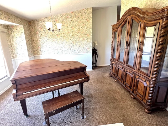 19358 Edgewater Dr, Port Charlotte, FL 33948 - carpeted dining room featuring a chandelier, wallpapered walls, and wainscoting