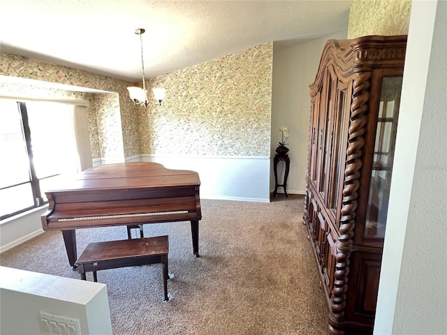 19358 Edgewater Dr, Port Charlotte, FL 33948 - sitting room with a chandelier, carpet flooring, and wallpapered walls