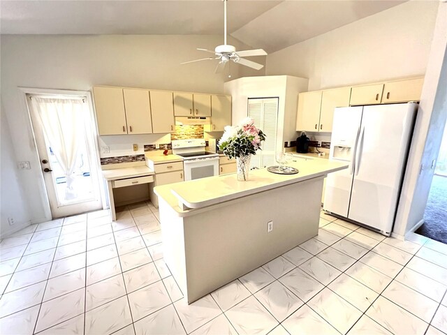 19358 Edgewater Dr, Port Charlotte, FL 33948 - kitchen featuring white appliances, under cabinet range hood, high vaulted ceiling, a ceiling fan, and light countertops