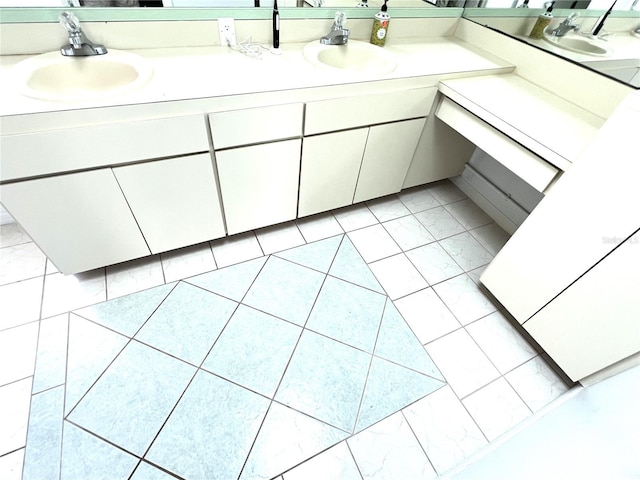 19358 Edgewater Dr, Port Charlotte, FL 33948 - bathroom featuring double vanity and marble finish floors