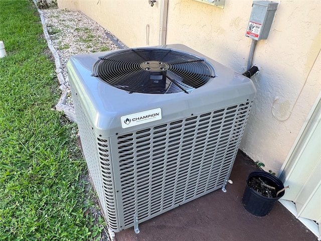 19358 Edgewater Dr, Port Charlotte, FL 33948 - exterior view of a central air condition unit and stucco siding