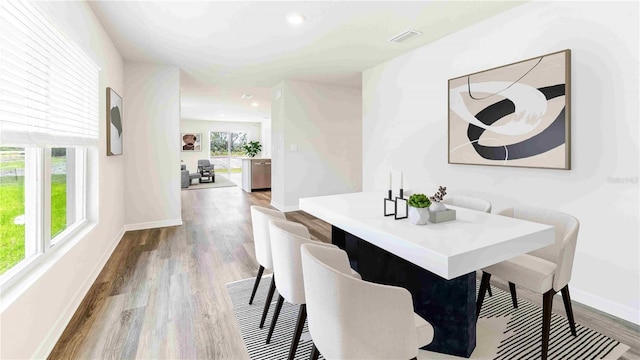 12039 Lansing Gln, Parrish, FL 34219 - dining room with wood finished floors and recessed lighting