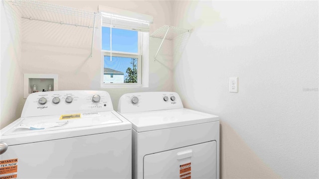12039 Lansing Gln, Parrish, FL 34219 - washroom with washer and clothes dryer