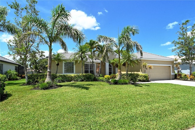 5080 Timber Chase Way, Sarasota, FL 34238 - view of front of house with stucco siding, driveway, a garage, and a front yard