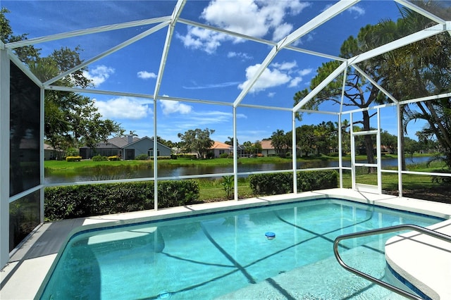 5080 Timber Chase Way, Sarasota, FL 34238 - outdoor pool with glass enclosure, a water view, a residential view, and a patio